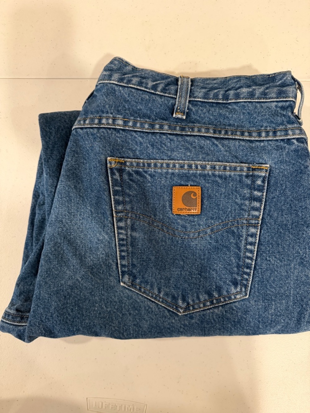 Carhartt Blue Denim Jeans with Plaid Flannel Lining